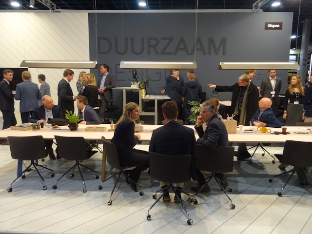 people talking and working