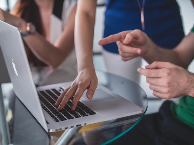 people working on a computer
